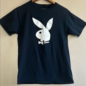 Playboy Rabbit Head T-Shirt White Bunny Logo
Vintage Americana Vibe, 90’s Grunge
